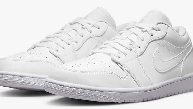 View of white Air Jordan shoes.